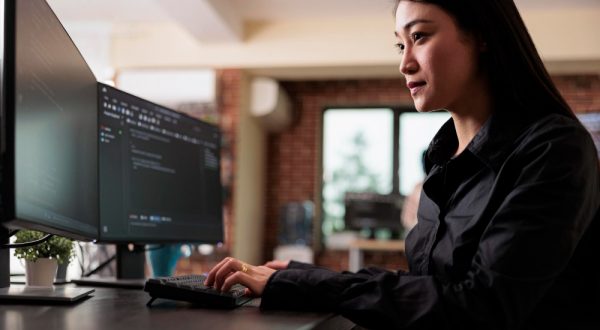cyber-security-company-employee-developing-blockchain-based-database-processing-system-cybernetic-officer-coding-machine-learning-software-protect-mainframe-encrypted-files